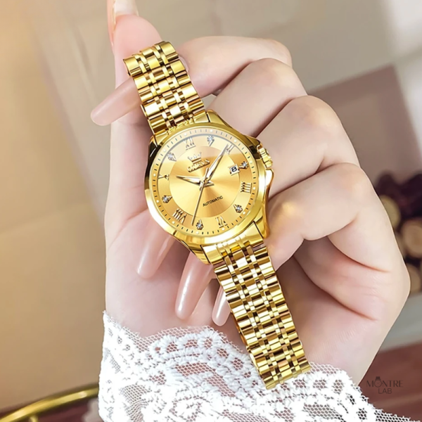 Élégante montre automatique femme, couleur dorée