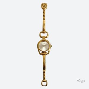 Montre femme dorée en forme irrégulière avec bracelet fin