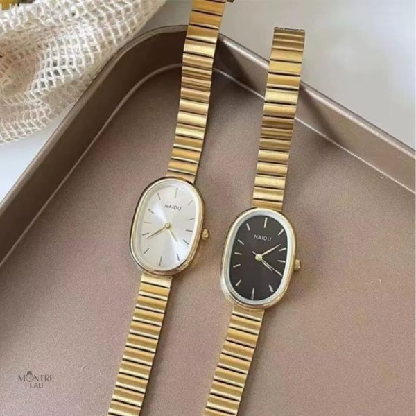 Accessoire féminin : Montre Dorée avec bracelet large
