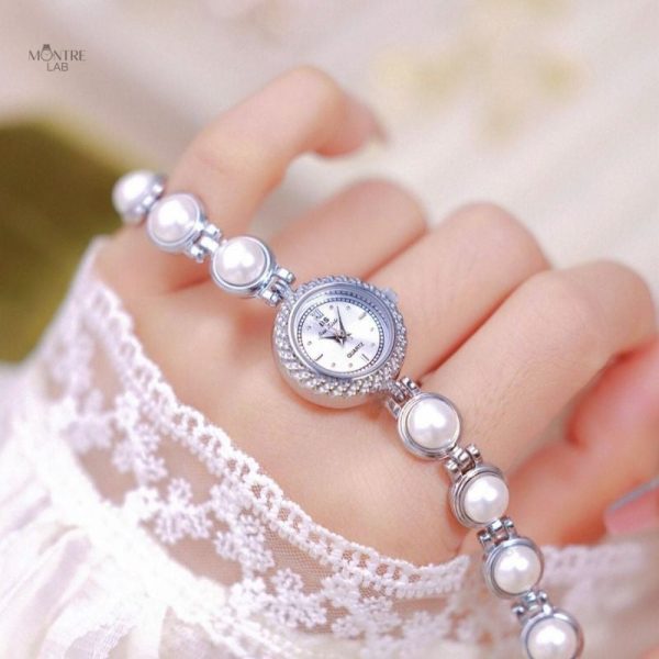 Montre chic pour femme, design perle médiévale