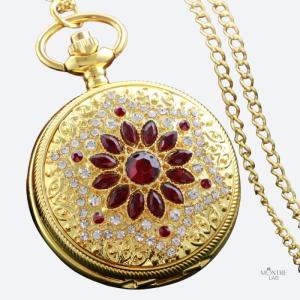 Montre à gousset femme dorée avec pierre précieuse