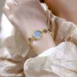 Montre femme luxe, design rond et résistant à l'eau