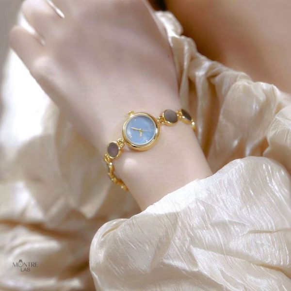 Montre femme luxe, design rond et résistant à l'eau