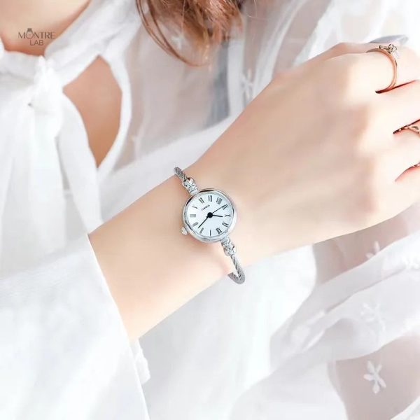 montre-luxe-quartz-femme-jonc-torsade-acier-style-vintage-1 Montre femme luxe quartz jonc torsadé en acier vintage