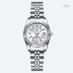 Montre élégante pour femme, finition en métal argenté