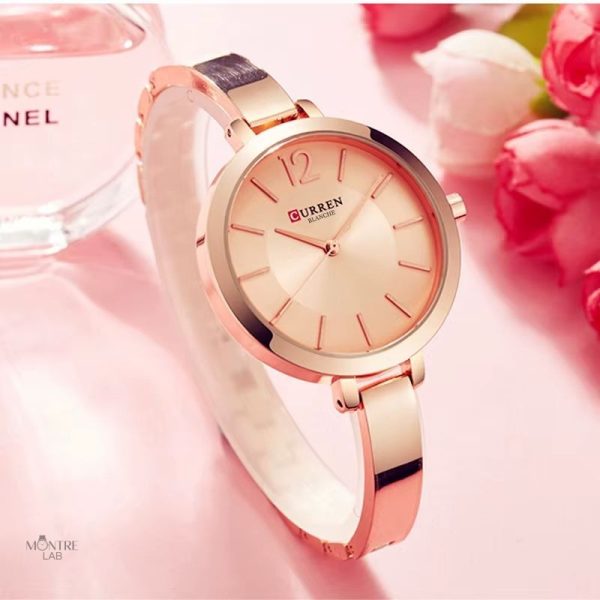 Accessoire élégant pour femme, montre quartz ronde minimaliste
