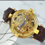Design classique de montre squelette pour femme en cuir marron