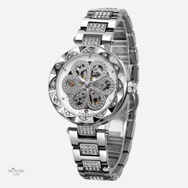 Montre femme au design squelettique et décorations brillantes