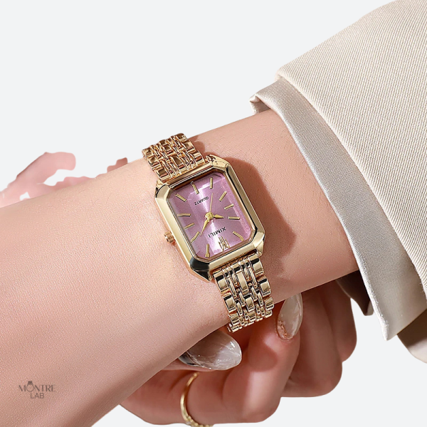 Montre dorée au design rectangulaire pour femme